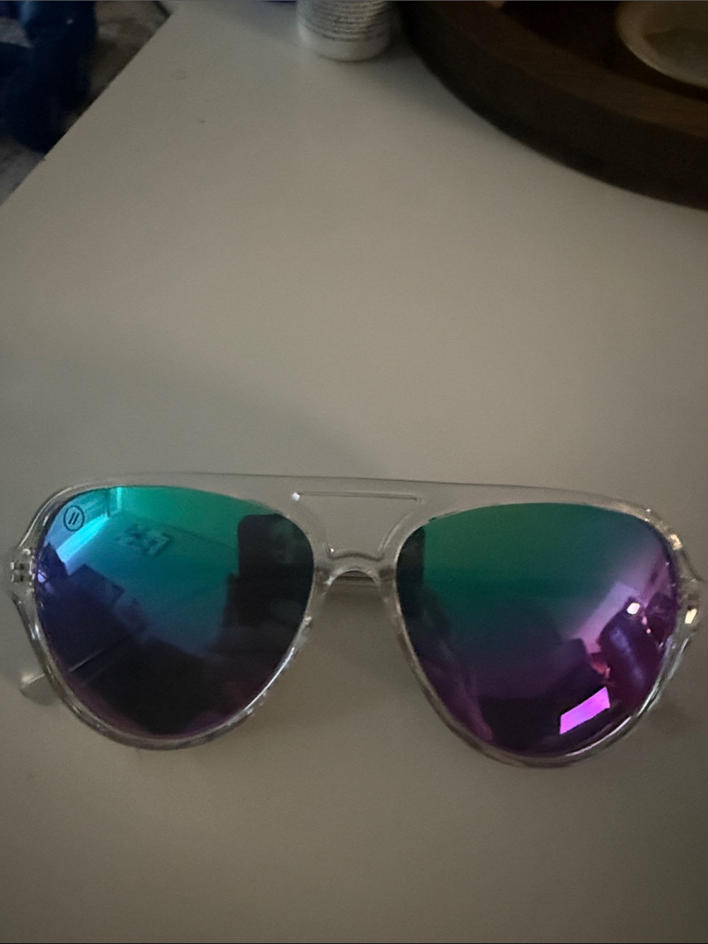 Clear Frame Sunglasses with Green-Purple Mirrored Lenses